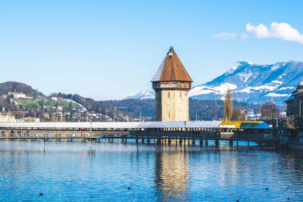 istock Old Tower and Bridge at Lucerne Switzerland 980114566