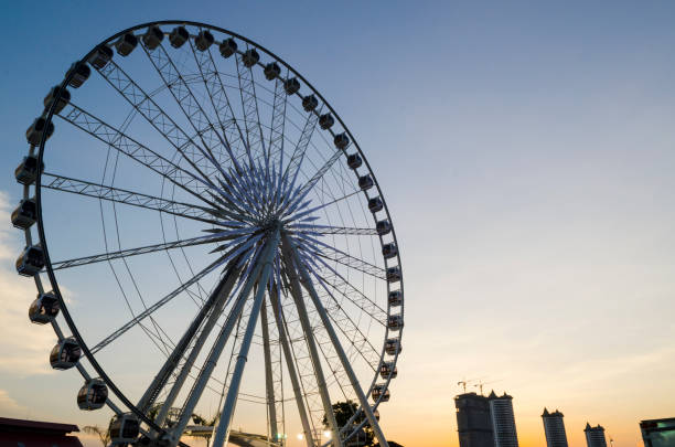 istock Beautiful large Ferris wheel. And the blue sky. 980118352