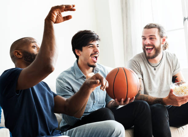 istock Friends cheering sport league together 980123184