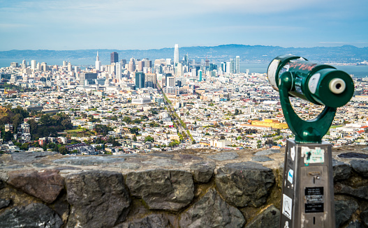 Binoculars , Telescope , Look out point on top of Twin Peaks Mountain Top view overlook the entire downtown skyline cityscape of the entire bay area - Vast Growing Downtown Skyline Cityscape of San Francisco , California as seen form the top of Twin Peaks Mountains