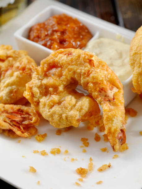 istock Beer Battered Tiger Prawns with Dipping Sauce 980130582