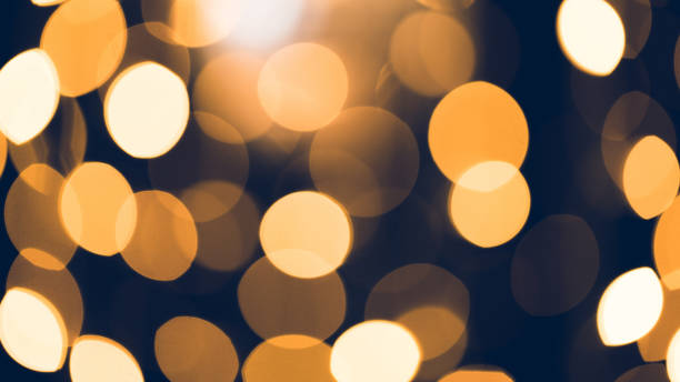 istock beautiful golden bokeh on black background 980132076