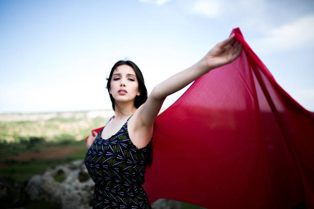 istock a young woman in the spring 980135942