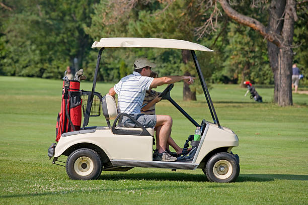 istock Father and Son in Golf Cart 98014714