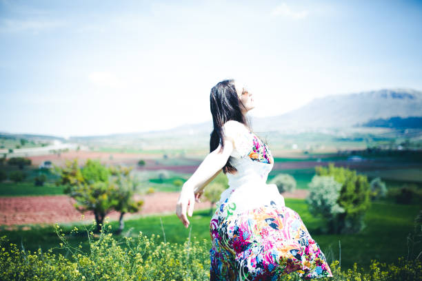 female model photography between flowers