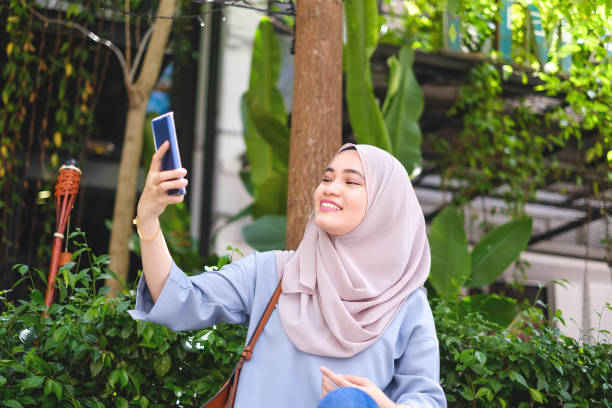 istock Muslim woman taking a selfie 980167974