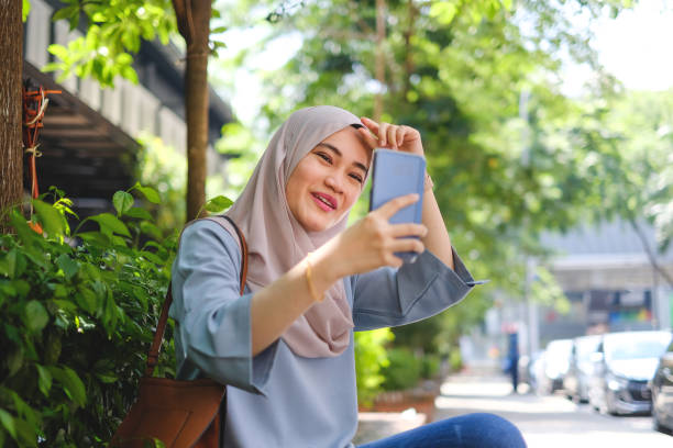 istock Muslim woman taking a selfie 980168008