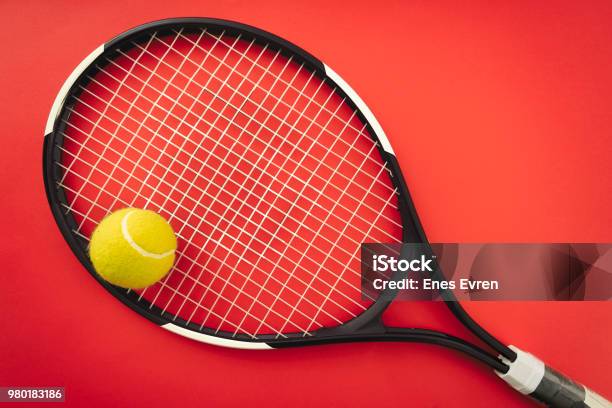 Tennis Racket And Tennis Ball On The Red Clay Court Stock Photo - Download Image Now