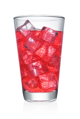 Glass of carbonated soda soft drink with ice cubes isolated on white background.  Clipping path