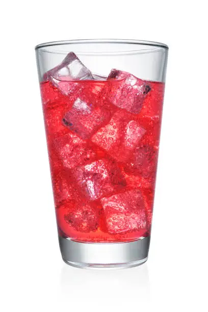 Photo of Glass of red soda isolated