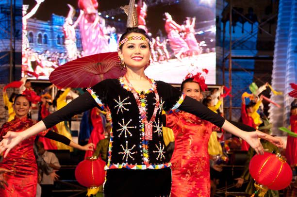 Colors of Malaysia Festival Kuala Lumpur, Malaysia - May 21st 2010 : Performers from the Sabah State indigenous communities, especially the Kadazandusun Murut, performed their traditional dance during the Colors of Malaysia Event.

The Colors of Malaysia Event showcases the country’s impressive cultural heritage with choreographed traditional dances, singing acts, marching bands and a spectacular fireworks display, representing Malaysia’s 13 states. it is a great way to get an up-close-and-personal view of Malay, Chinese, Indian, Kadazan, Dusun and Iban peoples and their uniquely different customs. kadazandusun stock pictures, royalty-free photos & images