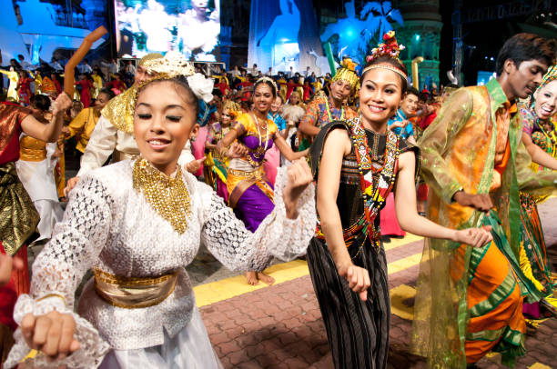 Colors of Malaysia Festival Kuala Lumpur, Malaysia - May 21st 2010 : Multi ethnic group of young Malaysians with traditional costume performed dances at the Colors of Malaysia Event. The Colors of Malaysia Event showcases the country’s impressive cultural heritage with choreographed traditional dances, singing acts, marching bands and a spectacular fireworks display, representing Malaysia’s 13 states. it is a great way to get an up-close-and-personal view of Malay, Chinese, Indian, Kadazan, Dusun and Iban peoples and their uniquely different customs. kadazandusun stock pictures, royalty-free photos & images