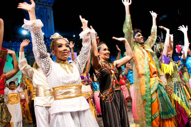Colors of Malaysia Festival Kuala Lumpur, Malaysia - May 21st 2010 : Multi ethnic group of young Malaysians with traditional costume performed dances at the Colors of Malaysia Event. 

The Colors of Malaysia Event showcases the country’s impressive cultural heritage with choreographed traditional dances, singing acts, marching bands and a spectacular fireworks display, representing Malaysia’s 13 states. it is a great way to get an up-close-and-personal view of Malay, Chinese, Indian, Kadazan, Dusun and Iban peoples and their uniquely different customs. kadazandusun stock pictures, royalty-free photos & images