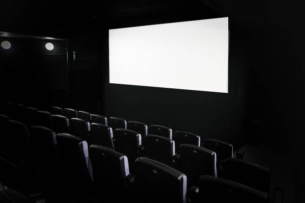 istock cinema white screen with seats 980196788