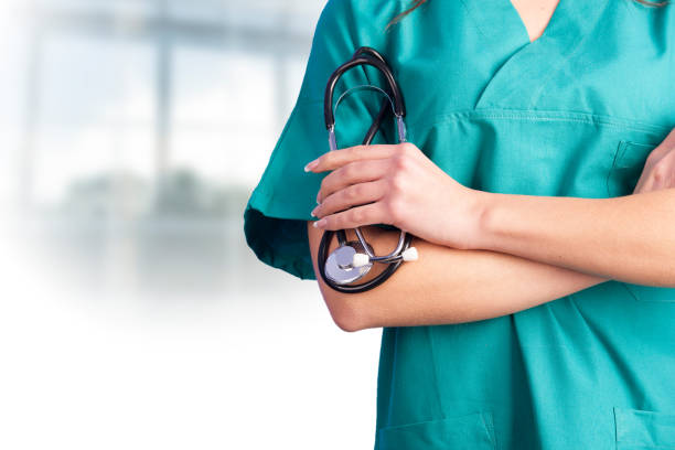 istock Nurse doctor with stethoscope close up 980209224