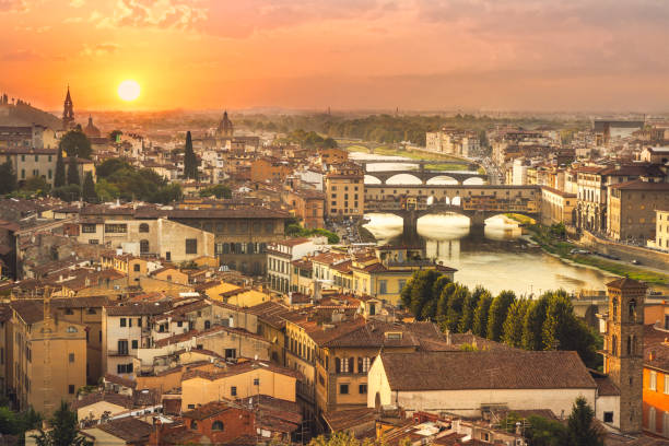 istock Florence sunset city skyline and Ponte Vecchio Bridge 980223040