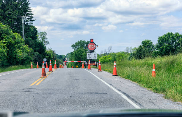 istock Rural Road Automated Construction Zone Barrier and Stop Sign 980228688