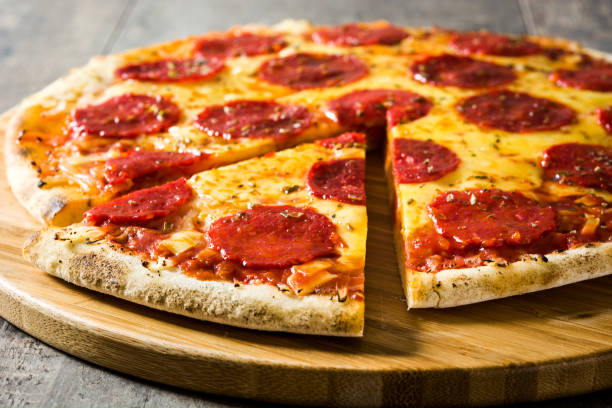 istock Hot italian pepperoni pizza 980228830