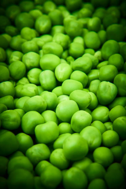 Fresh green peas background