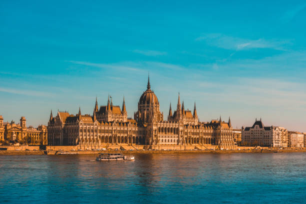 istock parliament building with river in the foreground at budapest 980232926
