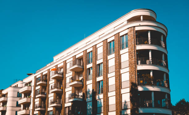 istock expensive real estate corner building with curved structure 980232994
