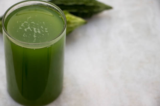 istock image of bitter gourd and its juice 980235850