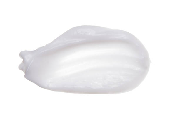 istock Cosmetic face cream isolated on white background 980236458
