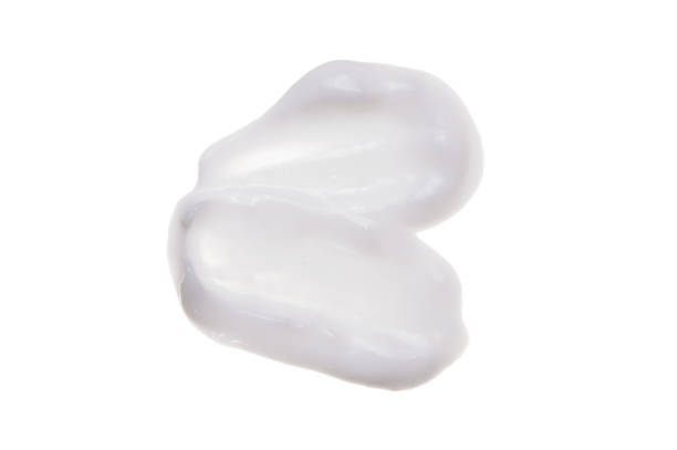 istock Cosmetic face cream isolated on white background 980236468