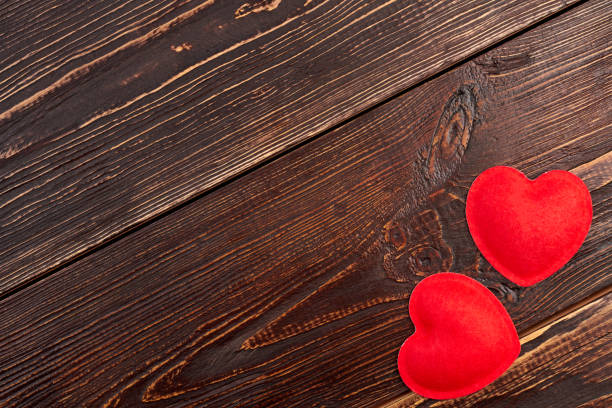 istock Valentines Day hearts on textured background. 980236626