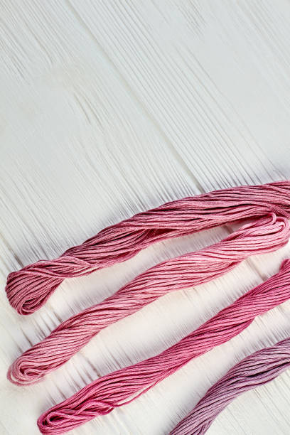 istock Four bunches of threads for embroidery. 980244182
