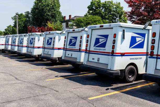 USPS Post Office Mail Trucks. The Post Office is Responsible for Providing Mail Delivery IV Logansport - Circa June 2018: USPS Post Office Mail Trucks. The Post Office is Responsible for Providing Mail Delivery IV united states postal service photos stock pictures, royalty-free photos & images
