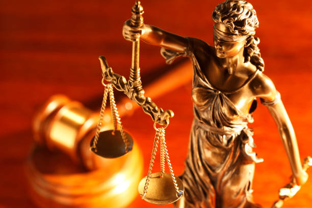 istock Lady Justice And Gavel On Desk 980262984