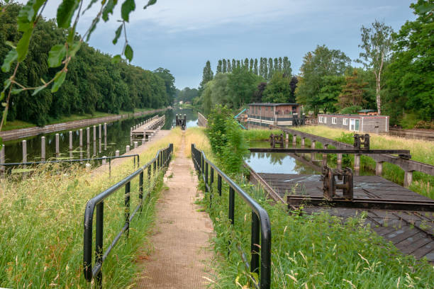 istock Ancient draw bridge and old locks complex in the Netherlands 980271680