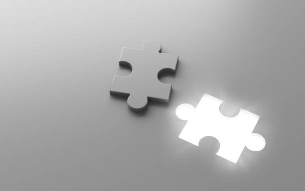 istock A white jigsaw puzzle piece with a glowing hole, 3d illustration background 980272704