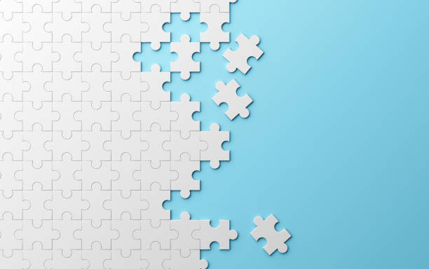 jigsaw puzzle muster textur auf blauem hintergrund getrennt. 3d illustration - geduldsspiel stock-fotos und bilder