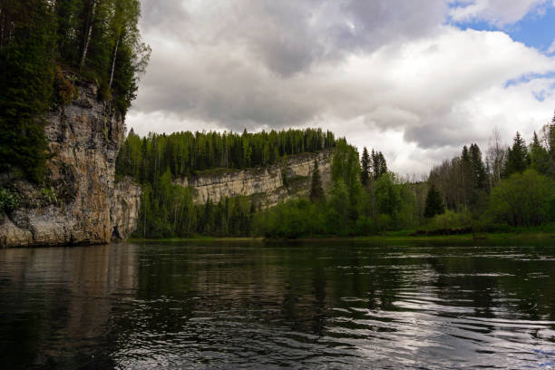 istock river with rocky shores on a cloudy day 980293542