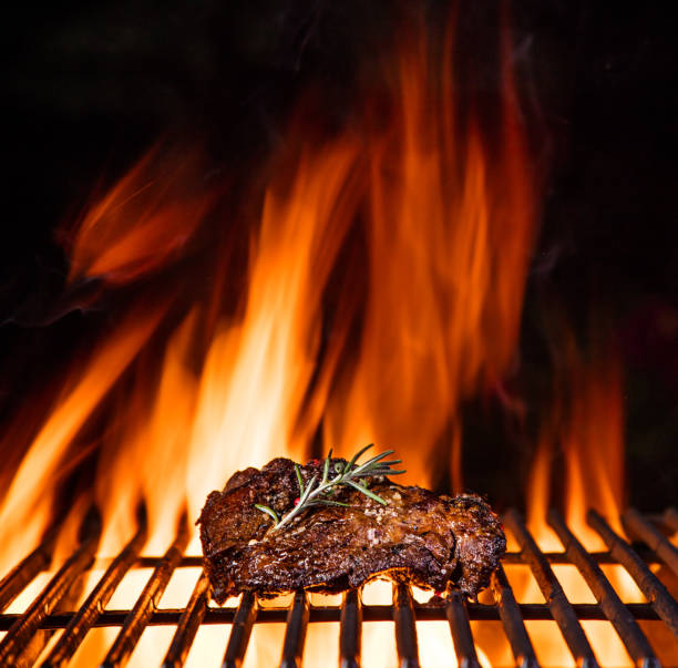 istock Beef steak on the grill with flames 980297030