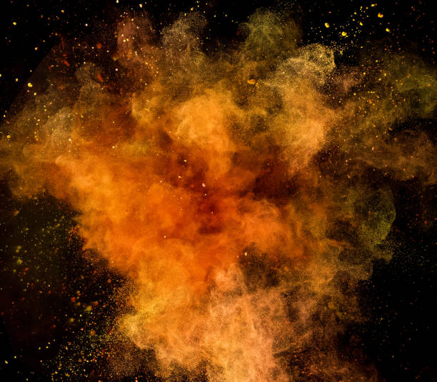 istock Colored powder explosion isolated on black background 980300338