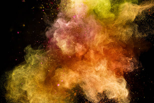 istock Colored powder explosion isolated on black background 980300786