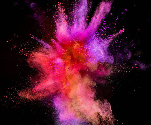 istock Colored powder explosion isolated on black background 980300826