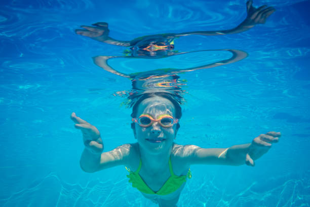 istock Underwater portrait of child 980313402