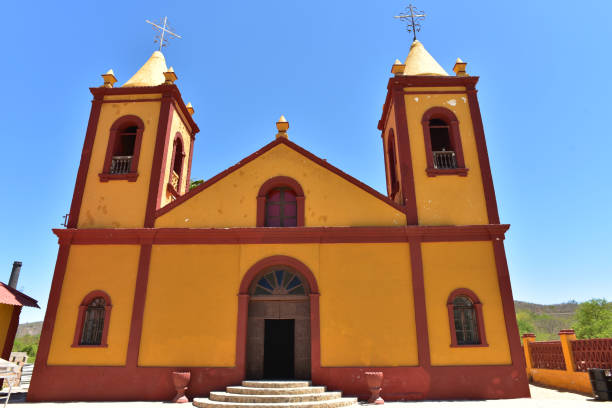 istock yellow church in Baja, Mexico 980316764