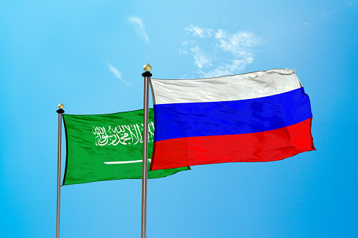 Russia vs Saudi Arabia flag on the mast