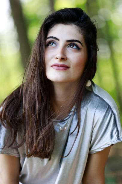 istock Young woman in the forest 980334556