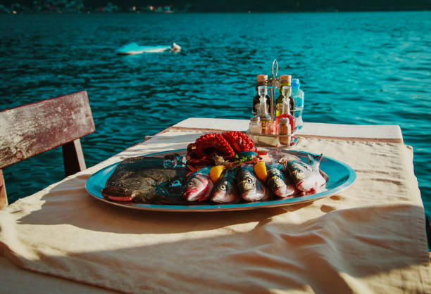 istock fresh seafood plate in restaurant at sea 980338680