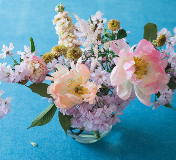 istock Pastel cut flowers in a glass vase 980371592