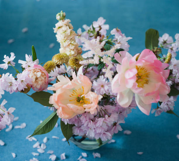 istock Pastel cut flowers in a glass vase 980371598