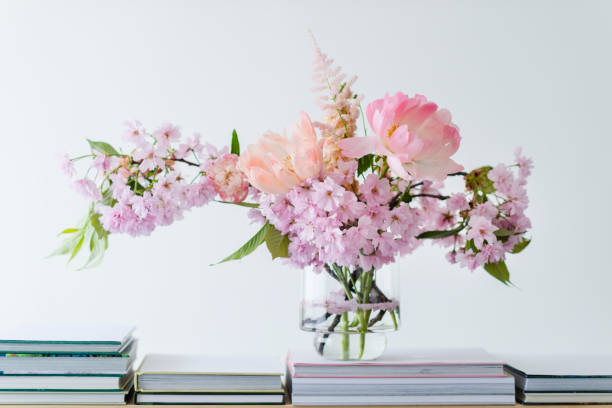 istock Pastel cut flowers in a glass vase 980371610
