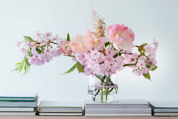istock Pastel cut flowers in a glass vase 980371618