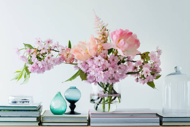 istock Pastel cut flowers in a glass vase 980371622